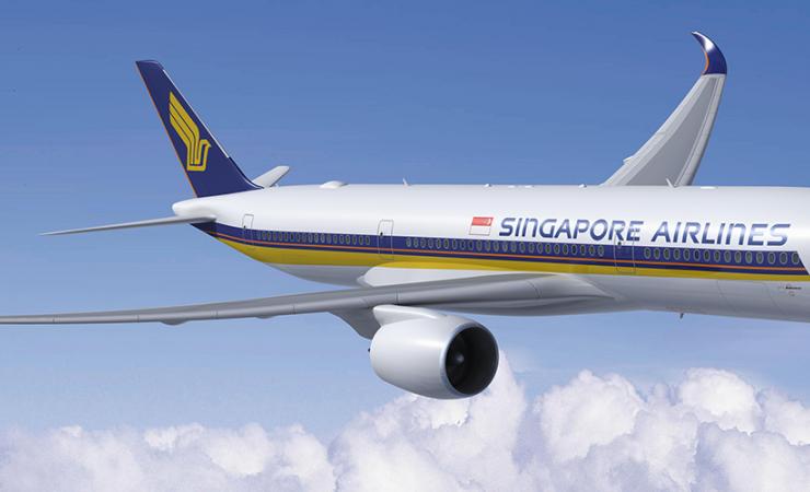 Singapore Airlines plane flying in blue skies