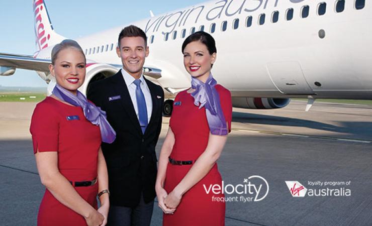 Virgin Australia Plane with three Attendants