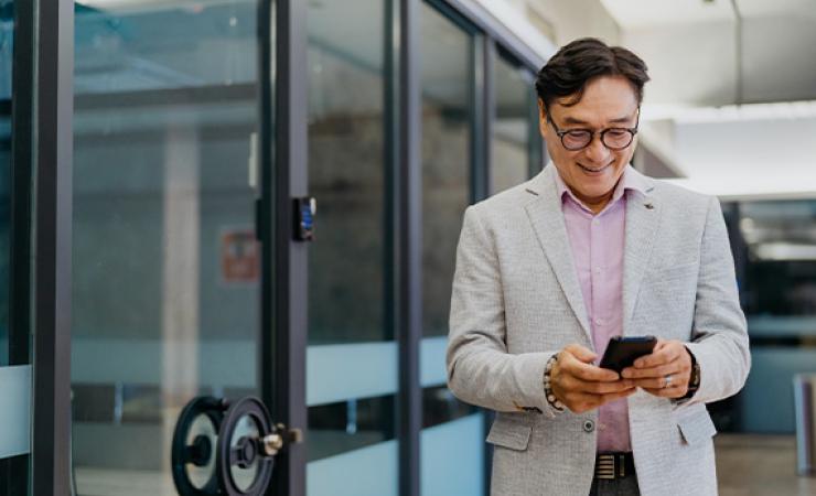 man looking at phone