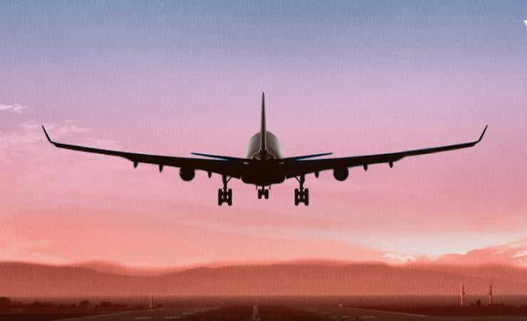 Virgin Australia Plan landing at Sunset