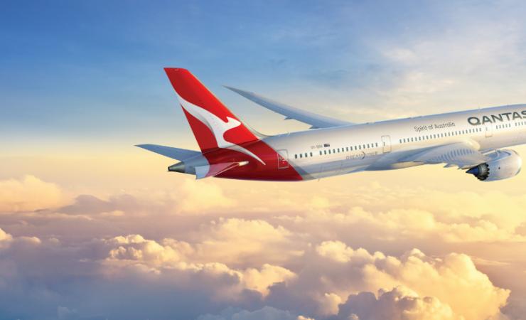 Qantas Dreamliner Flying through Clouds