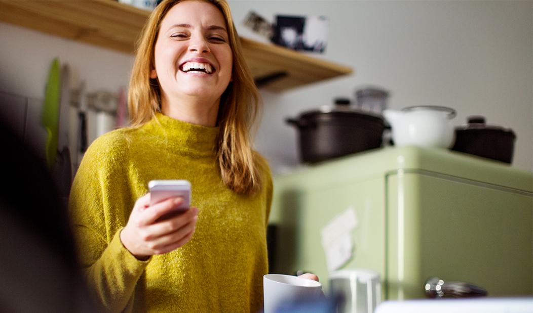 Lady smiling with phone