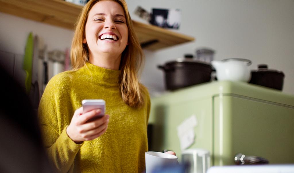 Lady smiling with phone